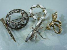 Selection of costume brooches to include a Dragonfly set with mother of pearl wings etc