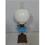 Cast Iron base oil lamp with blue font and twin burner