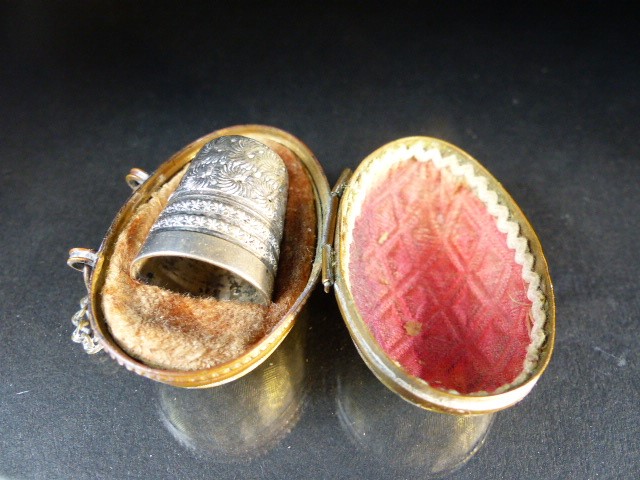 Hallmarked silver thimble by Charles Horner, Chester in original egg shaped box with finger chain - Image 8 of 16