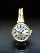 ROTARY watch: Ladies 9ct cased Swiss Made Rotary watch with rolled gold expanding bracelet