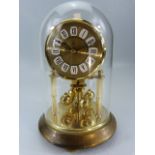 Modern Skeleton clock under glass dome