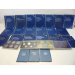 Approx 19 Blue cased collectors sets of British coins (not all complete) and seven additional