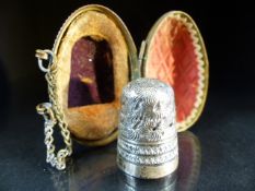 Hallmarked silver thimble by Charles Horner, Chester in original egg shaped box with finger chain