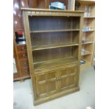 Darkwood Ercol bookcase with cupboard under