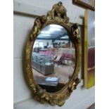 Vintage style gilt framed mirror decorated with putti