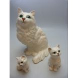 Beswick white cat with green eyes and her white green eyed kittens x 2
