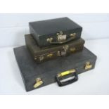 Three vintage vanity cases
