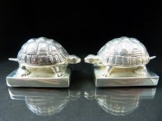 Pair of Unusual condiments in the form of a pair of Tortoise stamped 800