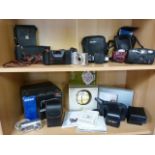 Large selection of cameras to include Nikon etc over two shelves