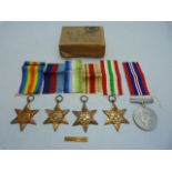 Medals: Four Stars, a collection of ribbons, a France and Germany Bar and a WWII medal