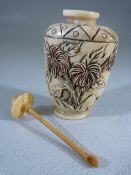 Chinese carved bone snuff bottle with bone lid and spoon. Carved with flowers and Phoenix. Small