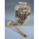 Chinese carved bone snuff bottle with bone lid and spoon. Carved with flowers and Phoenix. Small