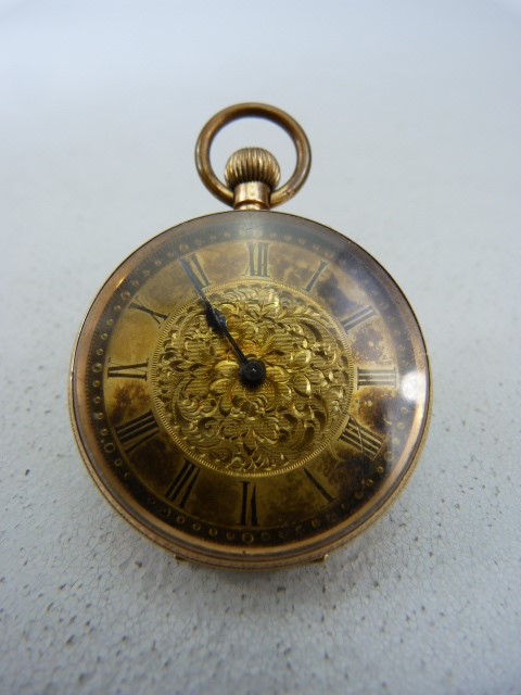 Ladies Gold coloured pocket watch (winds and runs) stamped 14k to inner case