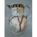 Tobacco Leaf pattern 18th Century Jug with Acanthus spout and handpainted flowers. Unmarked.