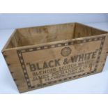 Black and White Whisky crate stamped London Airport