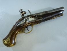 Flintlock Pistol: A slightly flared cannon barrel Flintlock pistol with ram rod and Brass