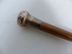 Hallmarked silver topped cane 'London'.