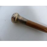 Hallmarked silver topped cane 'London'.