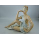 Ronzan figure of a scantily clad lady signed to base, made in Italy 1071, 31cm tall