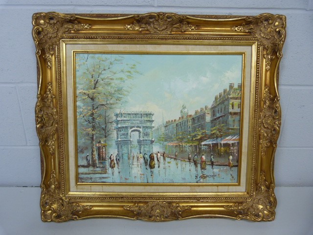 French Parisian street scene oil signed Garber in a Gilt frame.