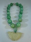 Chinese Jade necklace with butterfly jade drop.