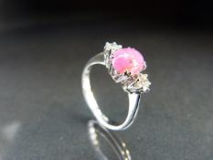 18ct White Gold Ruby and Diamond Three stone ring