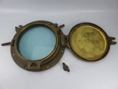 Antique bronze porthole: Porthole was manufactured by the John Roby LTD brass foundry in Rainhill (