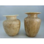 A Pair of Alabster Urns of cylindrical form and having translucent qualities. Sizes approx 17cm &
