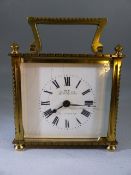 Carriage Clock: White enamelled clock face with bevelled glass (A/F) and marked JOHN WALKER SOUTH