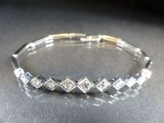 Believed to be Platinum Art Deco Style Bracelet set with eleven Graduated from the centre outwards