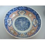 Two Chinese blue and white bowls - one large with Imari type colours internally, the other with