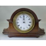 Antique miniature mantle clock (mahogany) with enamelled face and Roman Numeral Chapter ring.
