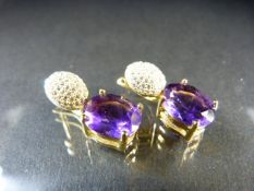 Pair of silver and Gold plated CZ and Amethyst drop earrings