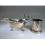 Silver hallmarked cream jug and a small hallmarked silver tankard (total weight approx 112g)