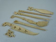 Inuit - Set of carved bone instruments/ tools all decorated with birds and Fish.