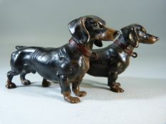 Cold painted Bronze figures of Daschunds. signed Geschutzt.