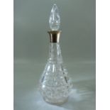 Mappin & Webb silver collared crystal decanter.