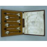 Cased set of six hallmarked silver coffee spoons with bean handles. Sheffield Cooper Brothers & Sons