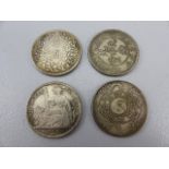 Three chinese silver tokens and a 1908 Republique Francaise Piastre de Commerce.