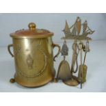 Unusual brass and copper ball footed coal scuttle of globular form with lid.