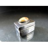 Small silver (marked 925) pill box with cabochon to lid and makers mark AN in a shield.