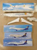 Airliner Display Models:Four plastic snap-fit models all with box and inner plastic bags . Three