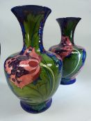 Frederick Rhead - Pair of Arts and Crafts 'Poppy Seed' pattern vases (Bursley ware, Woods) tube