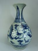 Large Chinese Blue & White Bottle shaped vase depicting dragons and a six figure character mark to