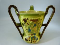 Early Brannam Pottery Tri-handled vase By James Dewdney. Dated 1900. A/F. Rd44561 Signed to base