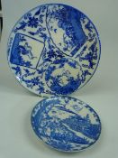 Two blue and white oriental plates with marks to bottom