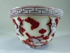 Peking Glass SAKE cup . White ground with red overlay depicting cranes flying through clouds.