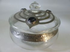 Arts and Crafts glass bowl and cover with star cut base, Banded and mounted with lead and set with