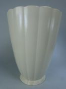Keith Murray for Wedgwood vase in the Moonstone colour on a footed base.