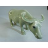 Oriental figure of a celadon coloured bull